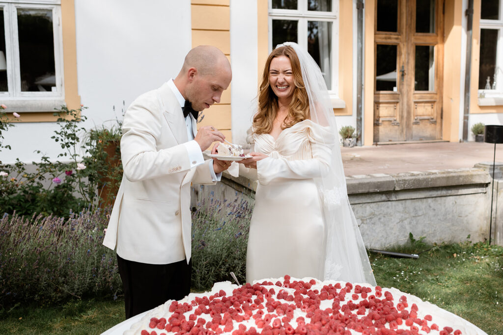 Wedding at Jordberga: a photographer's guide 12 Couple by the entrance of the main house with rose petals ready