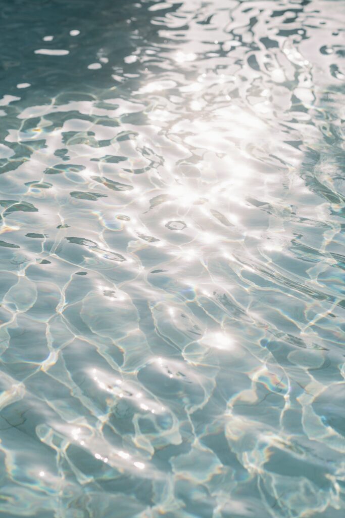 Sunlight sparkling on water, a quiet detail from the wedding day